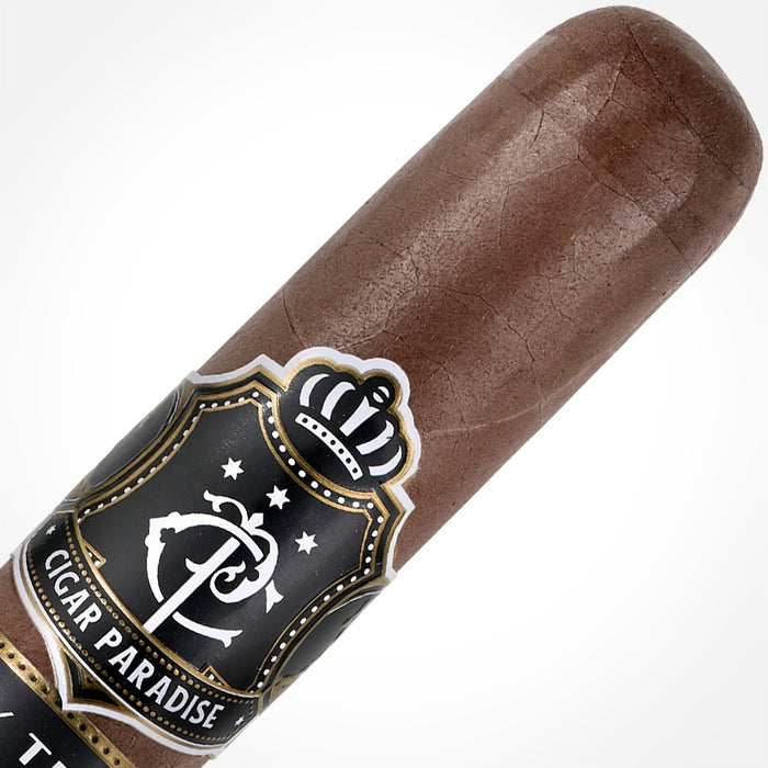 Cigar Paradise Family Tribute Rare Corojo Churchill 48x7 house blend cigar close-up showing Rare Corojo wrapper and cigar band.