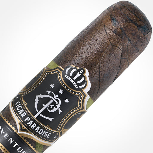 Cigar Paradise Adventure Dark Snake Sweet Tip Toro 52×6 house blend cigar close-up showing the dark Habano Maduro wrapper, thin green Candela spiral and Cigar Paradise band.