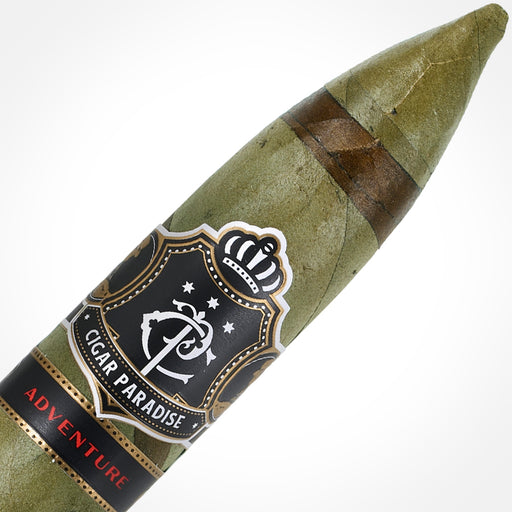 Cigar Paradise Adventure Snake Torpedo 52×6 house blend cigar close-up showing its distinctive pointed head, green Candela wrapper, thin Habano Maduro spiral and Cigar Paradise band.
